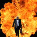 George walking in front of a fireball