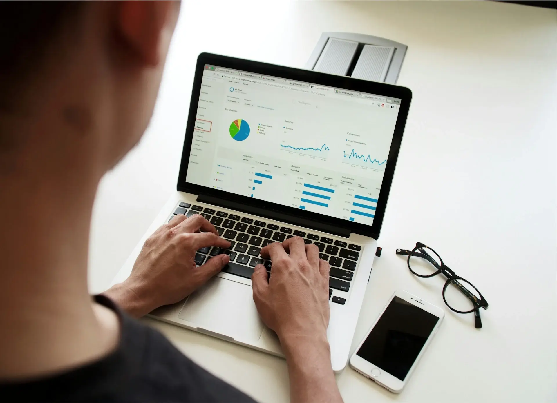 Person reviewing data on a computer